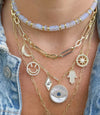 Symbols Necklace with Evil Eyes Hamsa Hands Smiley Face and North Star with Cubic Zirconia and Created Blue Sapphire