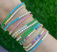 Etoielle Gold Tone Alternating Simulated Pink Sapphire and CZ Tennis Bracelet
